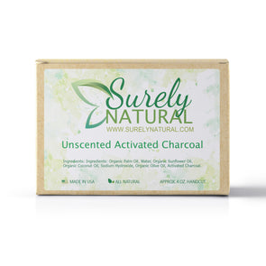 A packaged bar of unscented activated charcoal artisan soap, handcrafted by Surely Natural