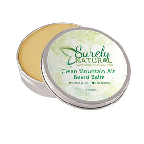 A tin of all-natural beard balm with clean mountain air fragrance from Surely Natural